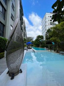 Bazén v ubytování Marvest Condo Hua Hin for rent nebo v jeho okolí