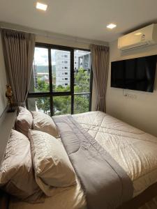 Postel nebo postele na pokoji v ubytování Marvest Condo Hua Hin for rent