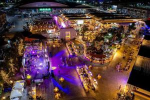 an overhead view of a market at night at Lanmuanghouse in Chiang Rai