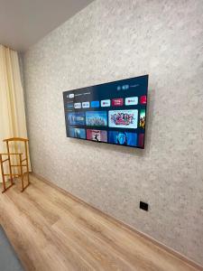 TV a/nebo společenská místnost v ubytování Апартаменты Костанай Жана Кала ВИП