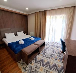 Letto o letti in una camera di Hotel Mountain Mestia