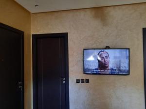 a flat screen tv hanging on a wall at MAZAPART in El Jadida