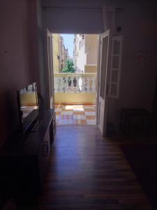 an open hallway with a view of a balcony at Shery''s home in 6th Of October