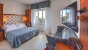 Кровать или кровати в номере Hotel Noris