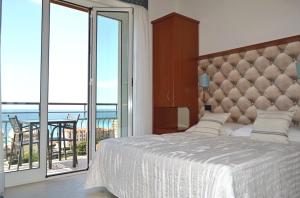Кровать или кровати в номере Hotel Noris