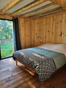 Postel nebo postele na pokoji v ubytování La cabane d' Esting