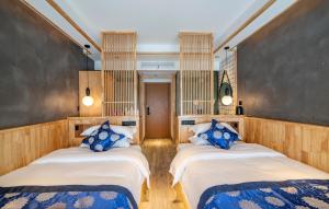 Voodi või voodid majutusasutuse Cozy Boutique Hotel toas