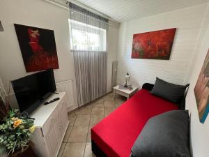 TV a/nebo společenská místnost v ubytování Strandnest Büsum