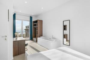 Ένα ή περισσότερα κρεβάτια σε δωμάτιο στο Pangea Luxury Rooms