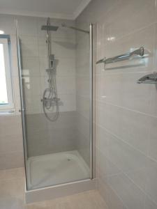 Ванная комната в Szépkilátás Apartman Balatonfőkajár