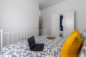 Postel nebo postele na pokoji v ubytování Flatguest La Herradura