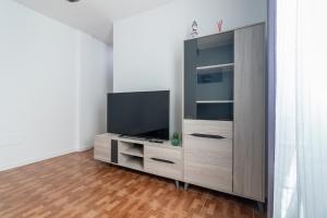 TV a/nebo společenská místnost v ubytování Flatguest La Herradura