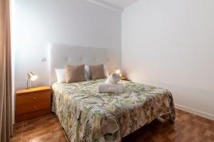 Postel nebo postele na pokoji v ubytování Flatguest La Herradura