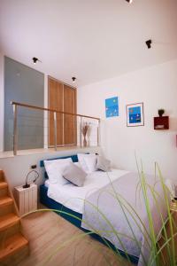 Un pat sau paturi într-o cameră la Villa Senorita