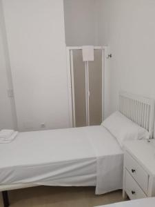 Llit o llits en una habitació de MARIA GUERRERO - LA CASITA DEL PESCADOR