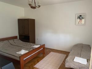 Postel nebo postele na pokoji v ubytování Аjdemote