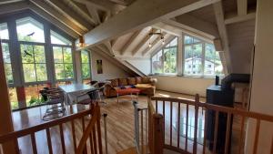 a view of a living room from the top of a house at Ferienhaus Kirsch in Missen-Wilhams +17 photos