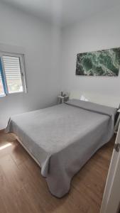 Ένα ή περισσότερα κρεβάτια σε δωμάτιο στο LA CASA DEL ALMÁCIGO