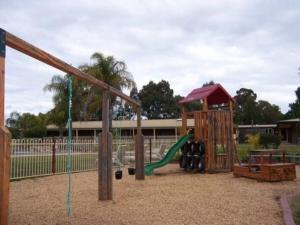 a playground with a slide and a slideintend at Cobram Barooga Golf Resort in Barooga
