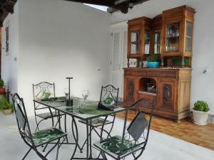 a dining room with a table and chairs at Casa Margherita in Ponza