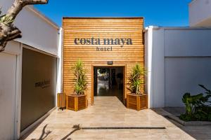 a building with a sign that reads casa maya hotel at Costa Maya Bodrum in Bodrum City