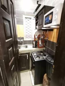 Kuchyň nebo kuchyňský kout v ubytování Charmant,bien localisé et lumineux Appartement F2S + 35 fotografií