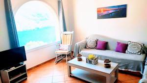 TV a/nebo společenská místnost v ubytování Calliope Paradise Balcony