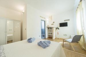 A bed or beds in a room at Giardino Nascosto