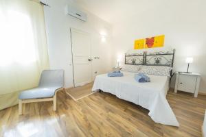 A bed or beds in a room at Giardino Nascosto