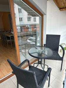 A balcony or terrace at Kondé Apartments A