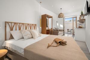 a bedroom with a bed with a skull on it at La MER 1 suite in Matala