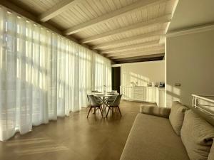 Posedenie v ubytovaní Bottego24 Suite, Apartment & Terrace
