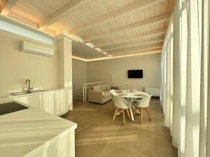 Televízia a/alebo spoločenská miestnosť v ubytovaní Bottego24 Suite, Apartment & Terrace
