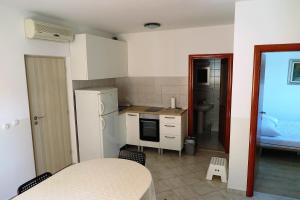 Kuchyň nebo kuchyňský kout v ubytování Apartments Kovacic