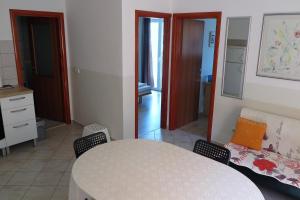 Postel nebo postele na pokoji v ubytování Apartments Kovacic