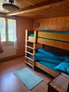 Postel nebo postele na pokoji v ubytování Ferienwohnung Berner Oberland - Guttannen