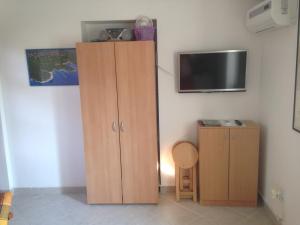TV a/nebo společenská místnost v ubytování Apartment and Studio Jelušić
