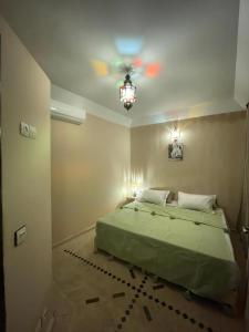 Postel nebo postele na pokoji v ubytování Riad Baroud + 17 fotografií