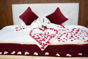 Voodi või voodid majutusasutuse Hotel Palazzo toas