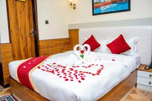 Voodi või voodid majutusasutuse Hotel Palazzo toas