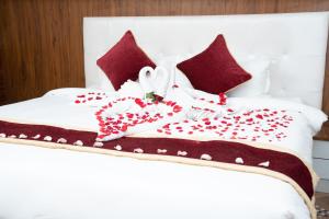 Voodi või voodid majutusasutuse Hotel Palazzo toas