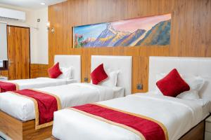 Voodi või voodid majutusasutuse Hotel Palazzo toas