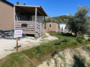 a house with a foreclosure sign in front of it at Glamping Tuscany - Podere Cortesi in Santa Luce