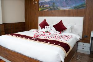 Voodi või voodid majutusasutuse Hotel Palazzo toas
