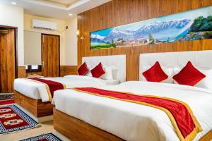 Voodi või voodid majutusasutuse Hotel Palazzo toas