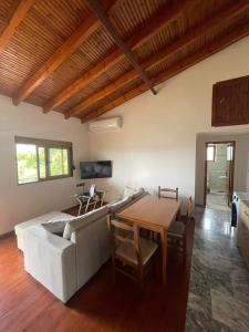 a living room with a couch and a table at Villa Anna in Sarandë