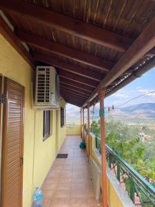 a balcony of a house with an air conditioner at Villa Anna in Sarandë