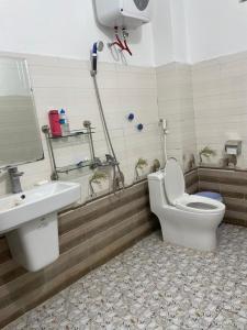 Koupelna v ubytování Hoàng Bách homestay + 10 fotografií