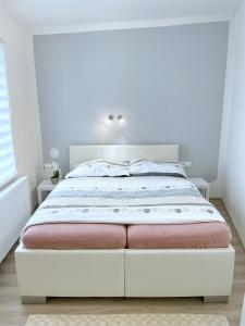 Postel nebo postele na pokoji v ubytování Apartmán U Náměstí