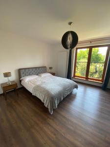 Postel nebo postele na pokoji v ubytování Apartment Gemer & Apartment Volovec